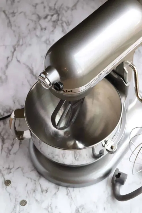 Kitchenaid mixer showing dime in bowl for calibration test
