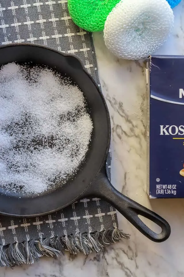 overhead view of cast iron grill pan with salt