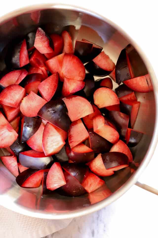 plums washed, pitted, and cit into chunks for making plum jam recipe