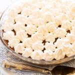 Chocolate pudding pie with piped whipped cream topping