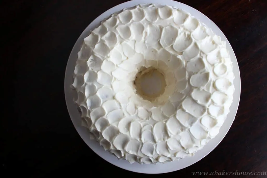 Overhead photo of ginger pear Bundt cake with cream cheese frosting.