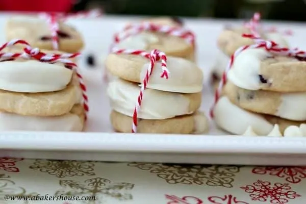 Stacks of three white chocolate chip and ginger cookies