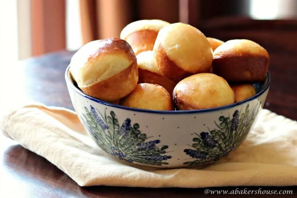 Brioche rolls in a pottery bowl