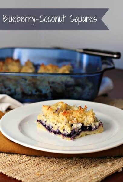 blueberry coconut square served on a white plate 