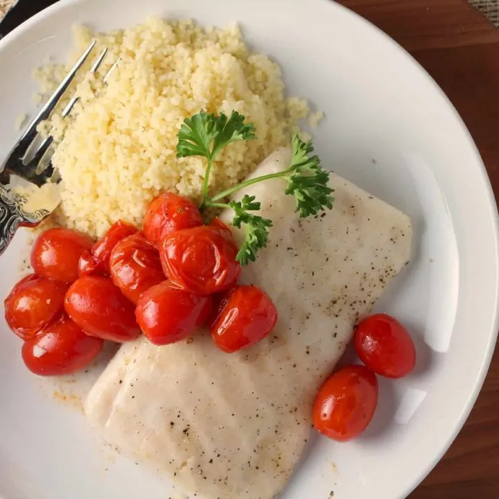 Paiche, roasted white fish with tomatoes