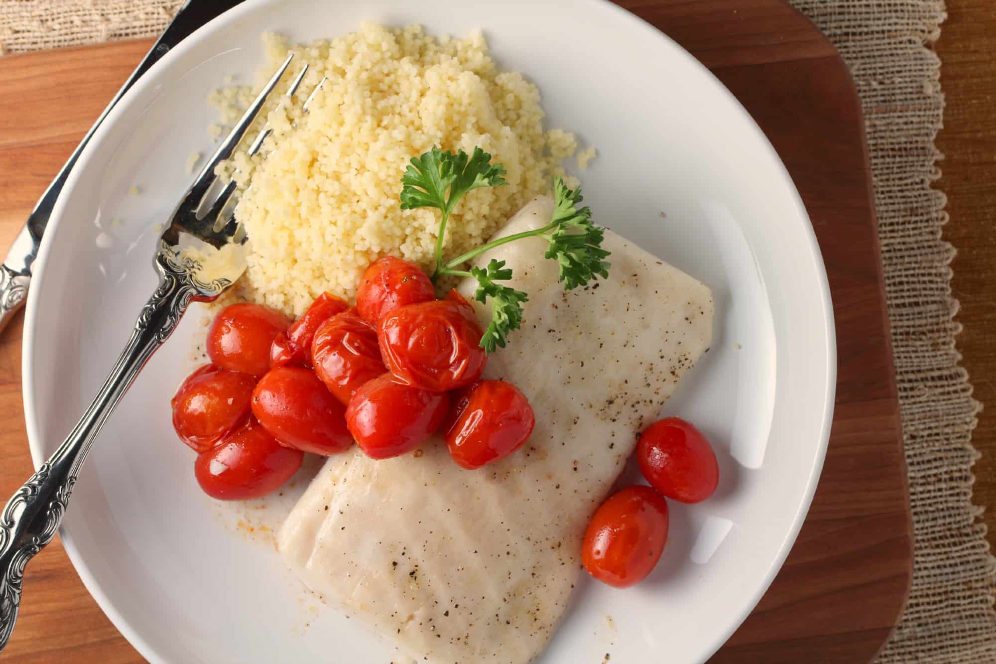 Paiche, roasted white fish with tomatoes