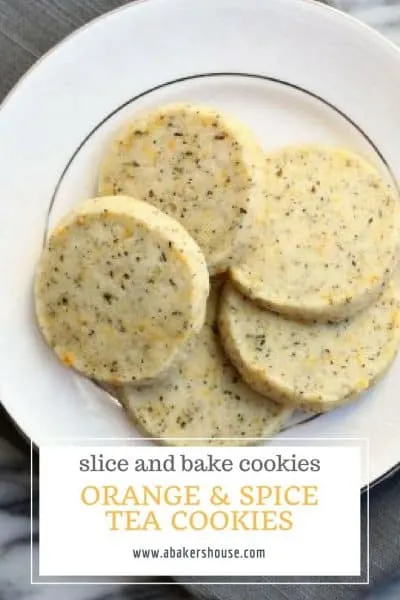 Pinterest image with text overlay of plate of orange spice tea cookies