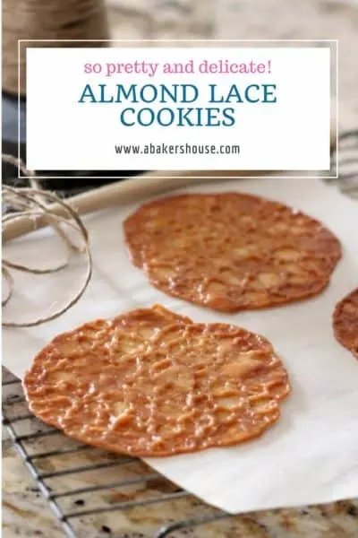 Pinterest image with text title overlay  with two almond lace cookies on parchment paper