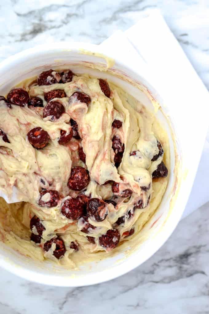 Folding the cherries into the batter for cherry quick bread