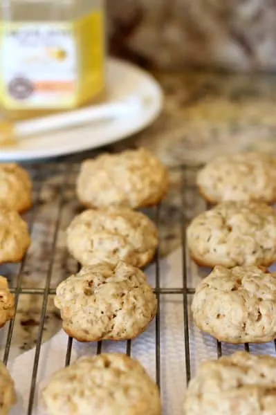 one dozen honey granola cookies baked and cooling on wire rack