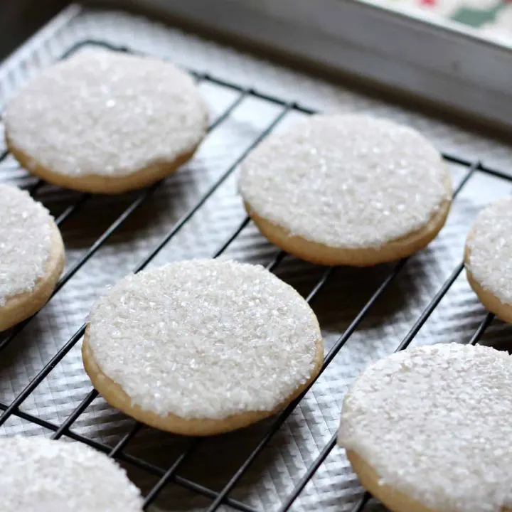 Sugar cookies with sprinkles on a wire cooling rack