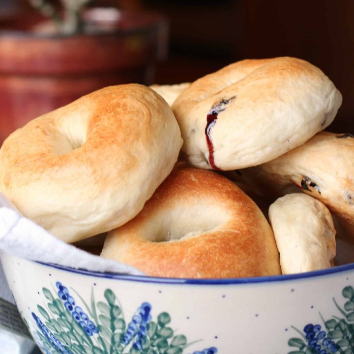 Blueberry bagels in a pottery bowl