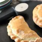 Clazones on a black baking sheet