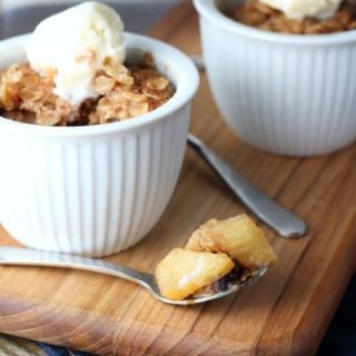 apple crisps on wood cutting board