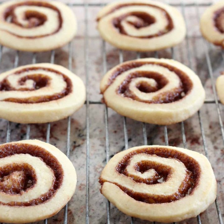 Cinnamon rolls cookies on wire cooling rack