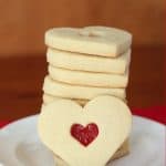 Pinterest image for stained glass heart cookies in a stack for valentines day cookies