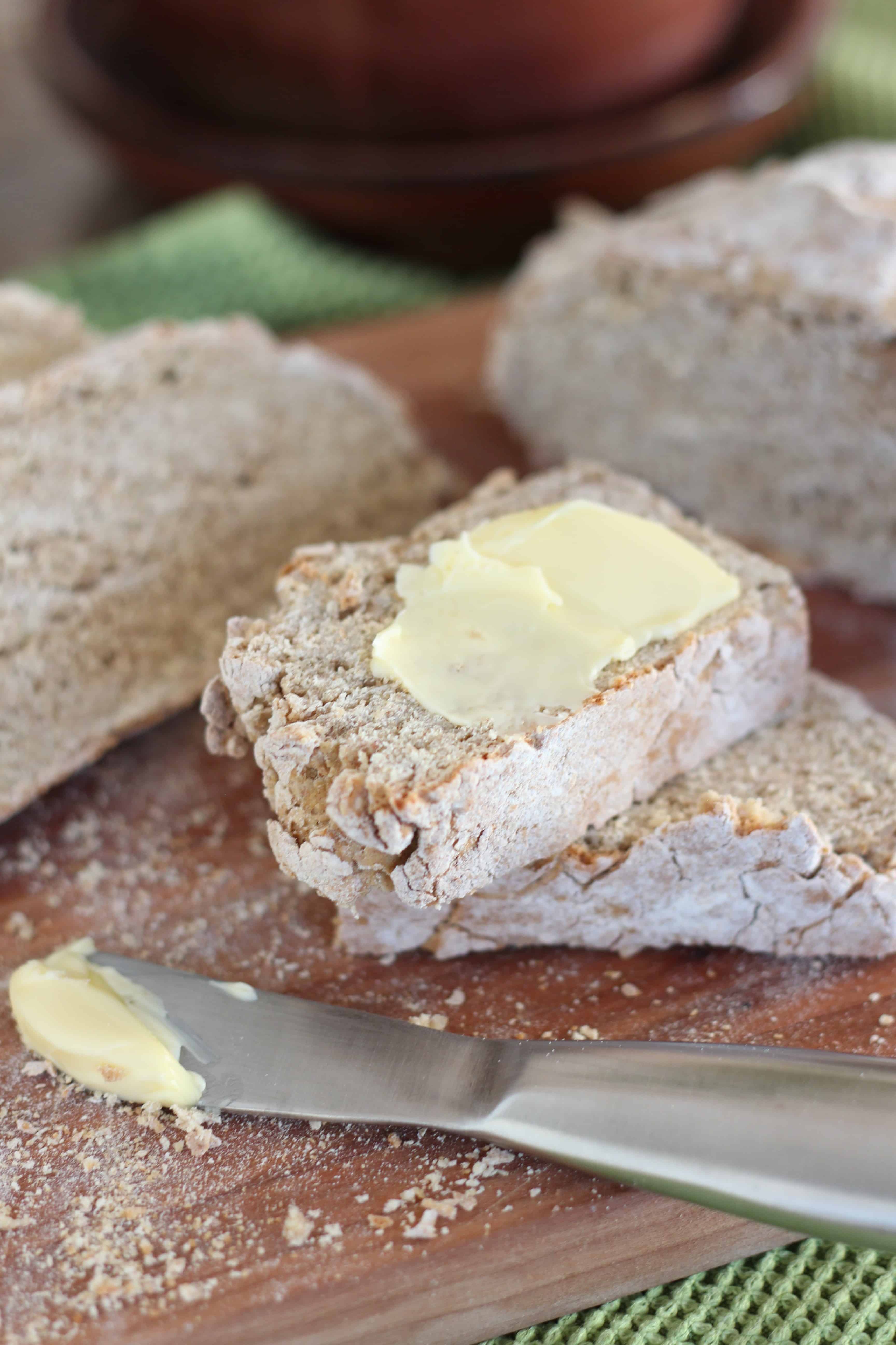 Irish brown bread on wooden cutting board