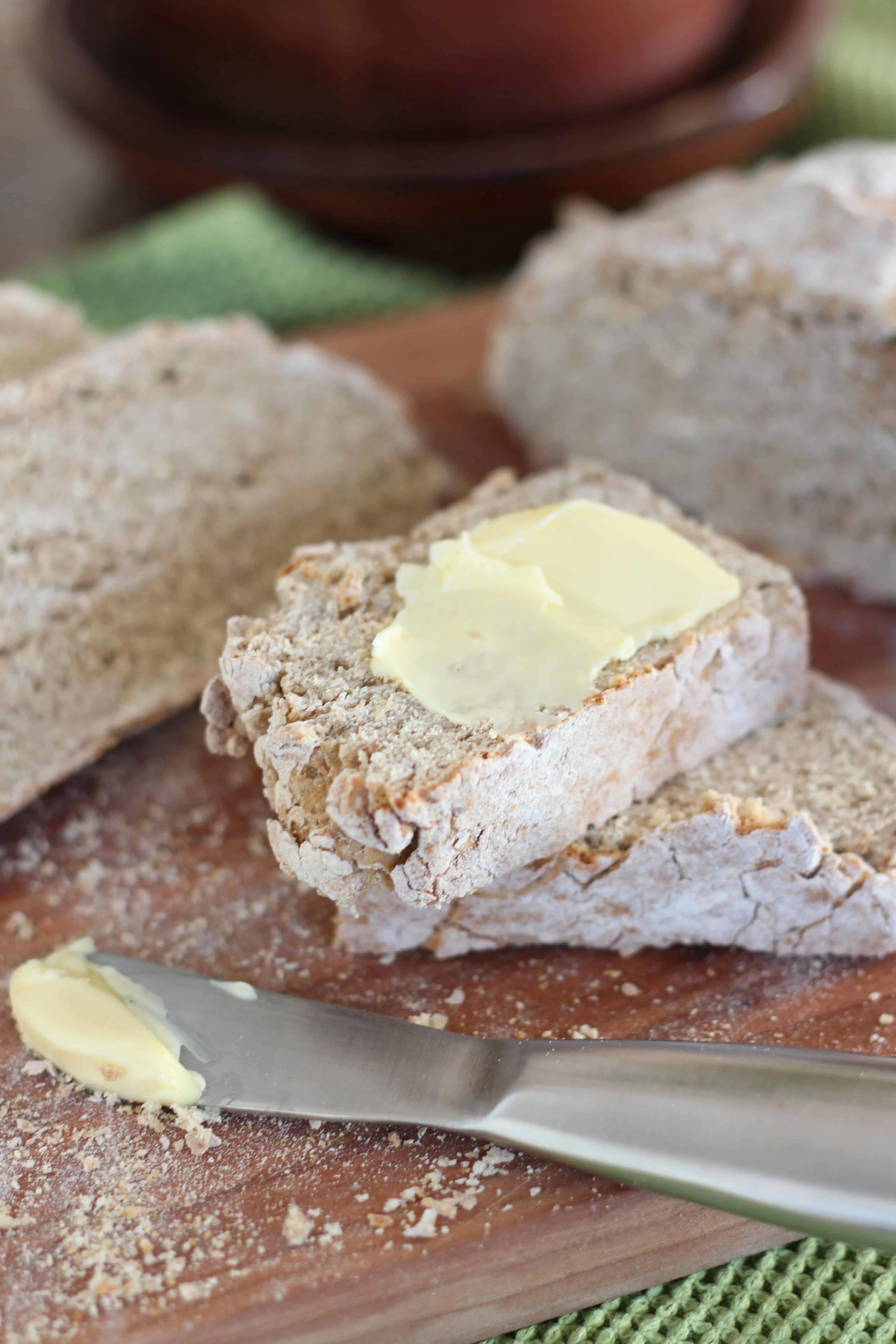 Irish brown bread on wooden cutting board