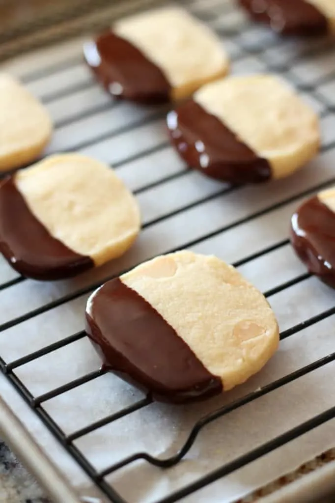 macadamia nut cookies on a wire cooling rack