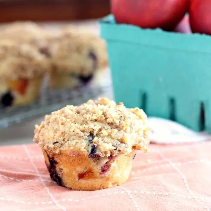 Single nectarine blueberry muffin with nectarines on side