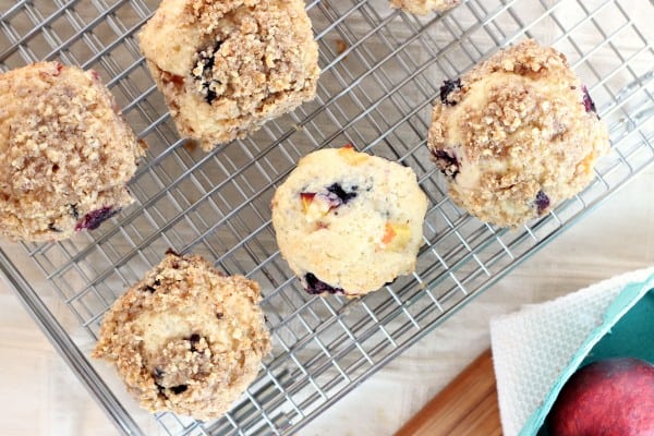 nectarine blueberry muffins overhead view on wire cooling rack