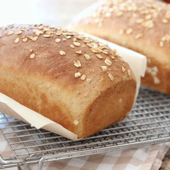 Maple Oatmeal loaves of bread on wire cooling rack