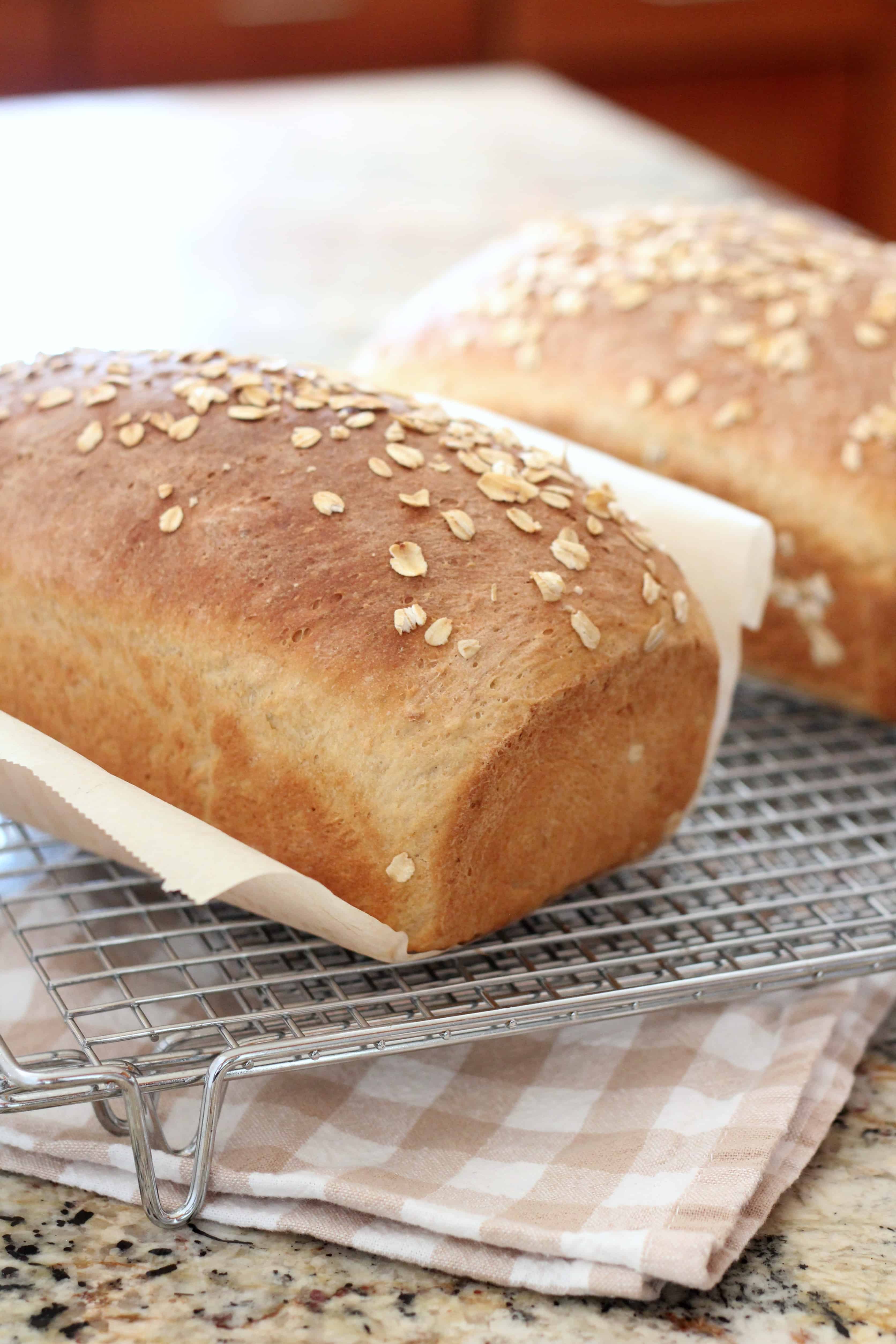 Maple Oatmeal loaves of bread on wire cooling rack