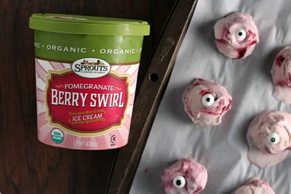 ice-cream-eyeballs on parchment paper and baking sheet pan