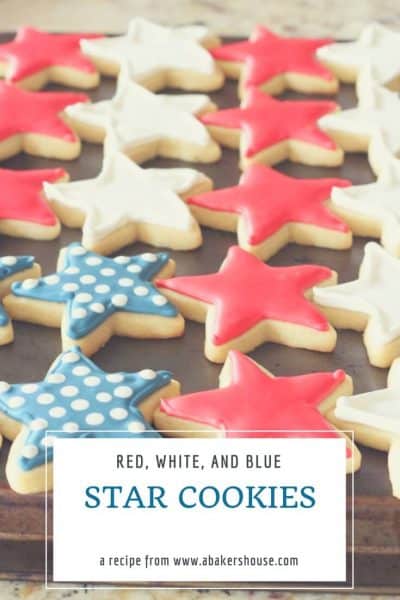 red, white and blue star cookies on baking tray
