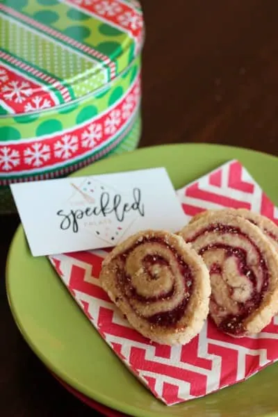 pinwheel swirled cookies on red napkin and green plate
