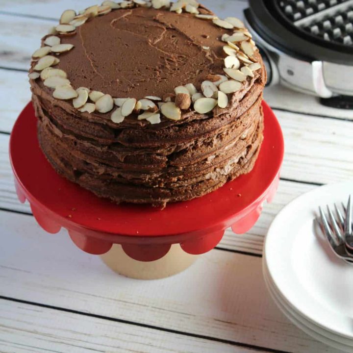 Gluten Free Chocolate layer cake made with waffles in each layer.