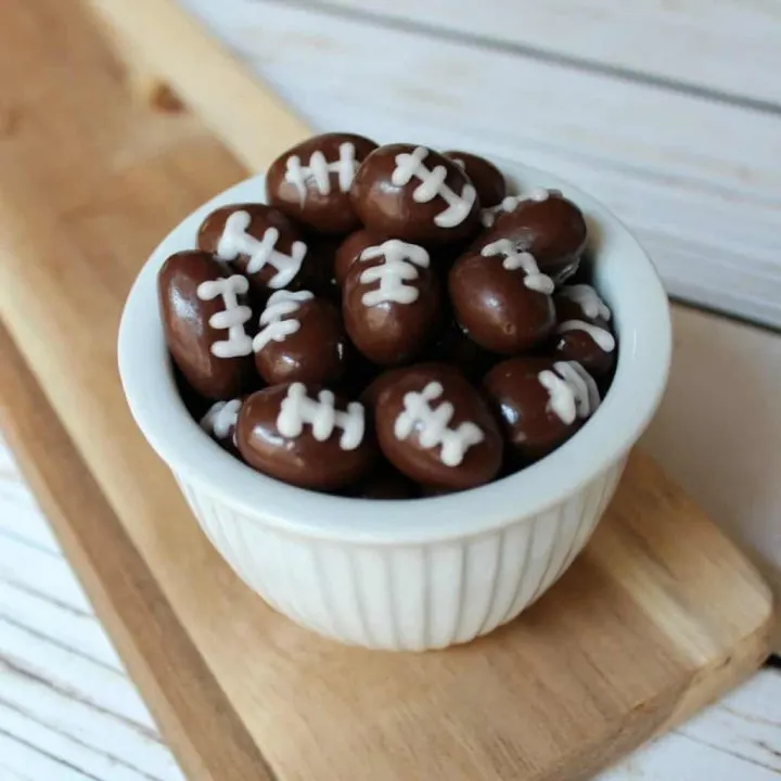 football bites covered chocolate almonds with football decorations