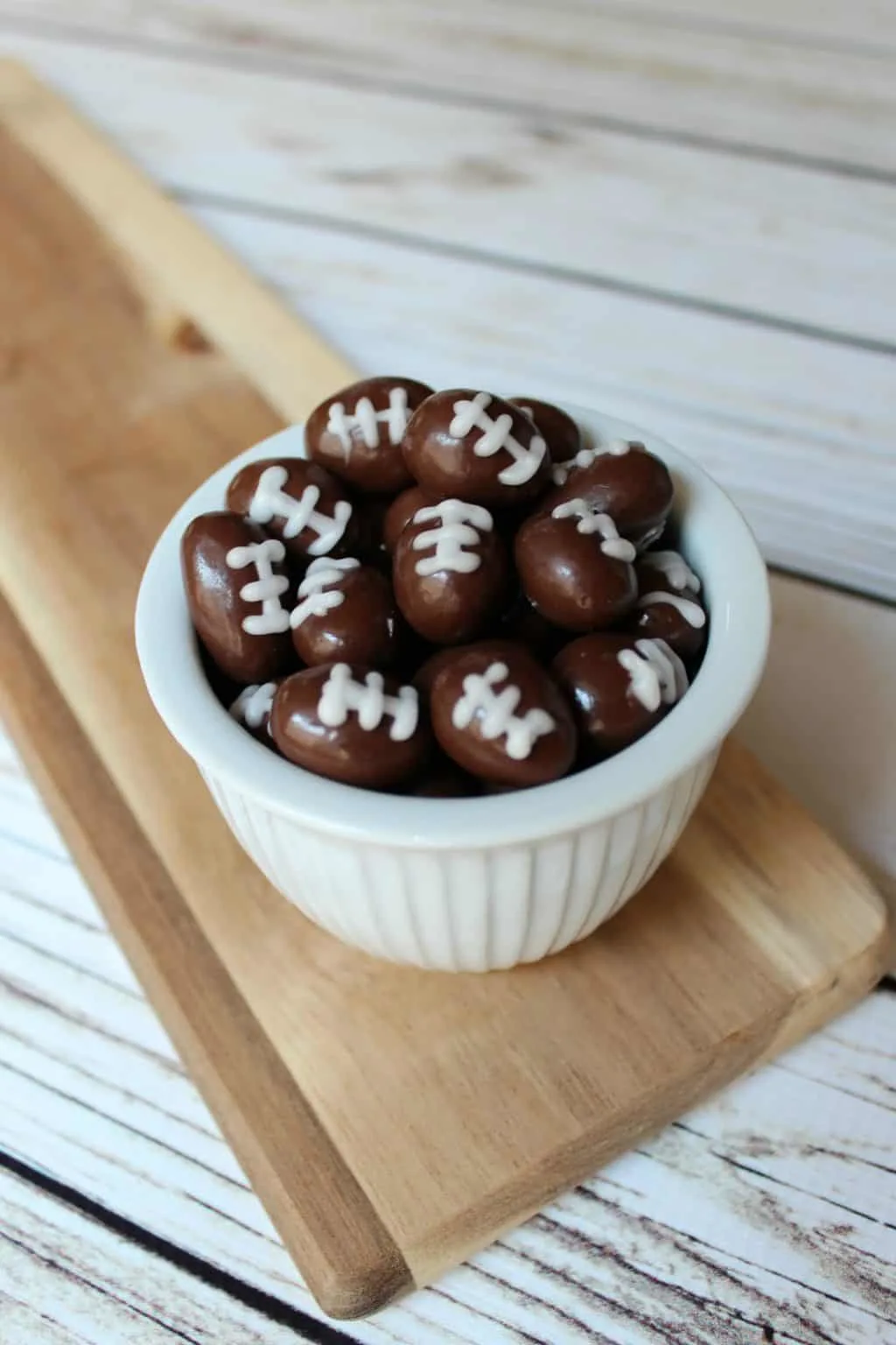 football bites covered chocolate almonds with football decorations