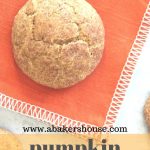 Pumpkin snickerdoodle cookei on an orange napkin
