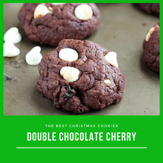 double chocolate cookies with dried cherries and white chocolate chips on a baking tray