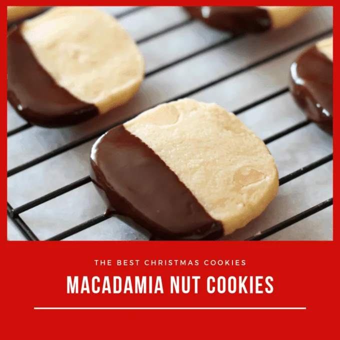 Chocolate dipped macadamia nut cookies on wire rack and parchment paper