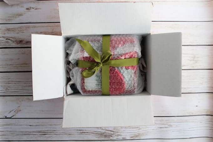 Bubble wrapped package in a rectangular shipping box