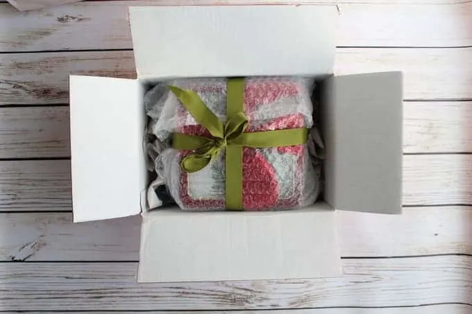Bubble wrapped package in a rectangular shipping box