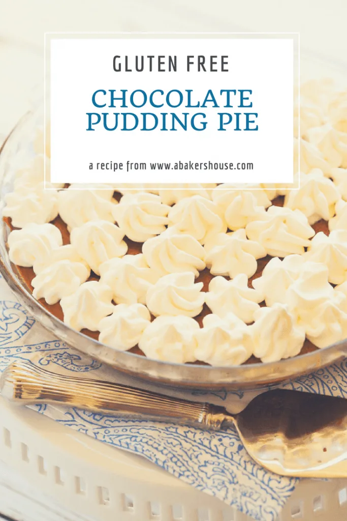 Pin for chocolate pudding pie with glass pie plate and pie serving on blue and white napkin