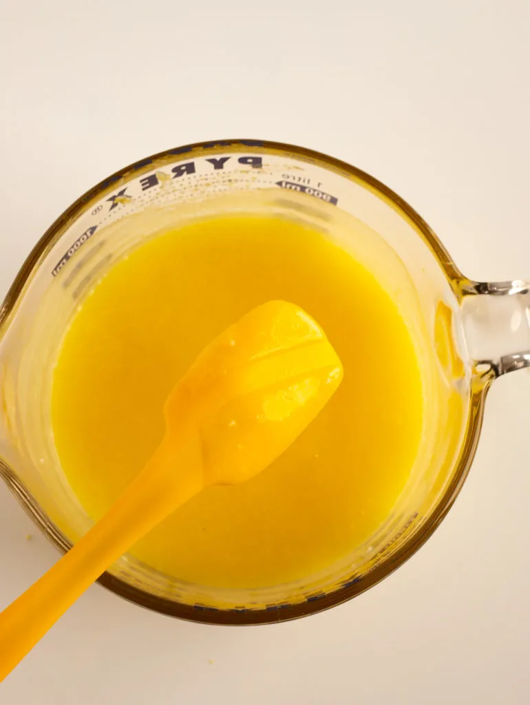 yellow spatula was dipped into bright yellow lemon curd