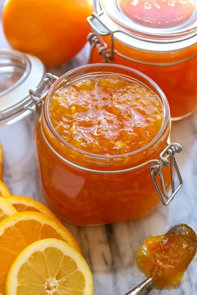 Jar filled with orange lemon marmalade