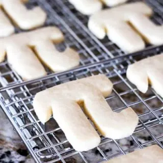Pi sugar cookies on a wire rack