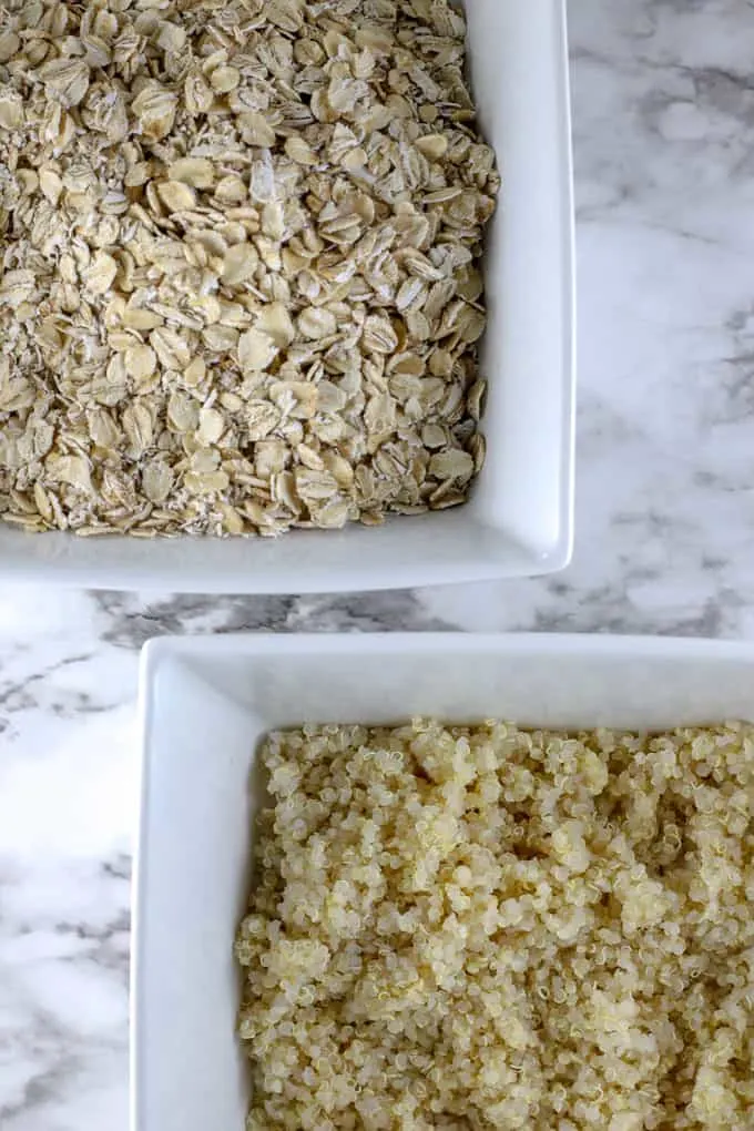 Two bowls of oats and quinoa ingredients for homemade aussie bites