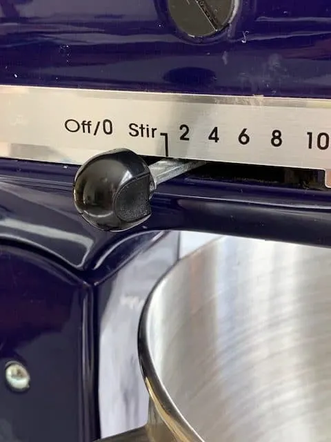 KitchenAid blue artisan mixer on stir