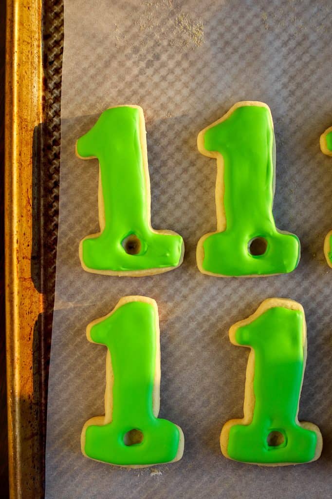 green background for hole in one golf cookies