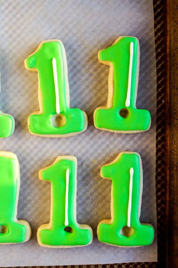 White golf pole on green cookies