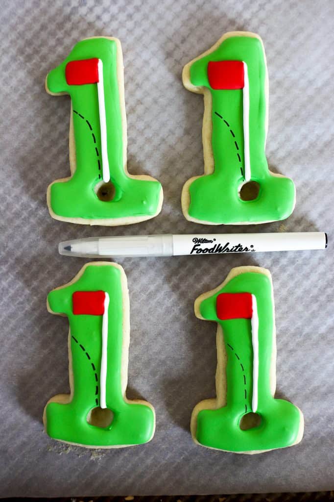 decorate hole in one cookies with wilton food writer pen