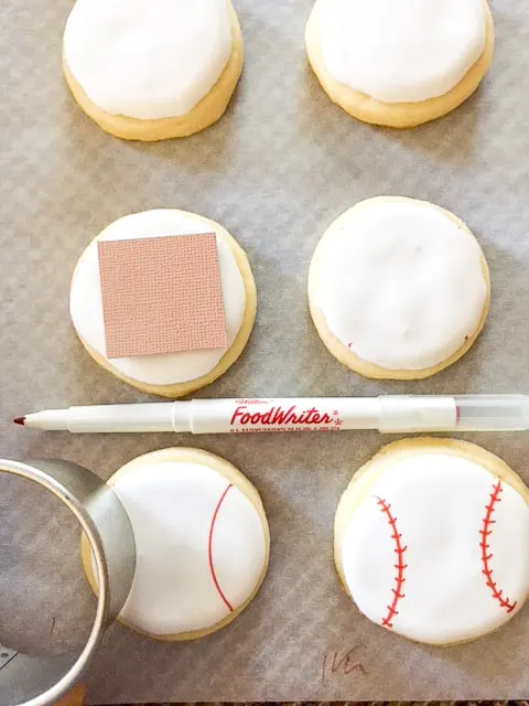 image showing how to make the red stitches on the baseball cookies