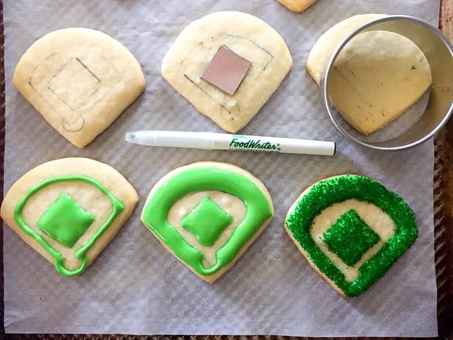 How to steps for decorating baseball diamond cookies with royal icing and sprinkles