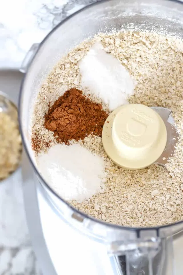 Dry ingredients for gluten free pumpkin muffins in the food processor